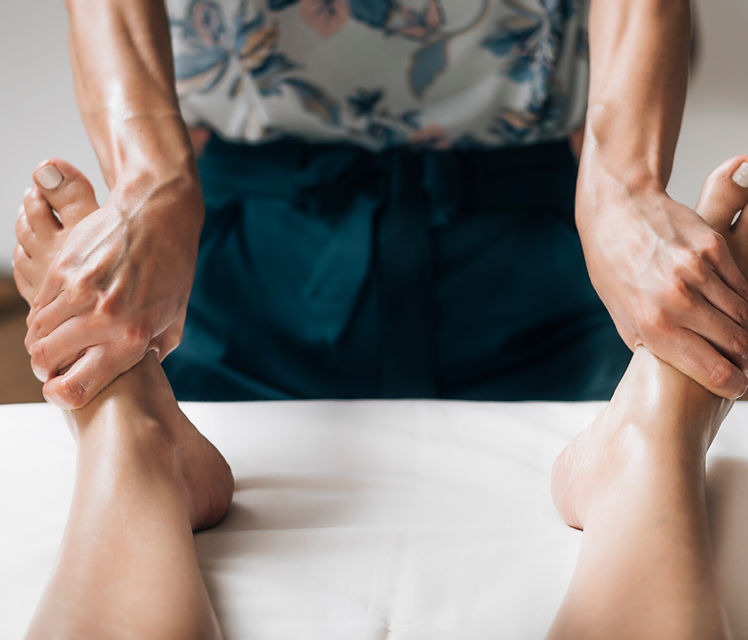Therapist performing massage
